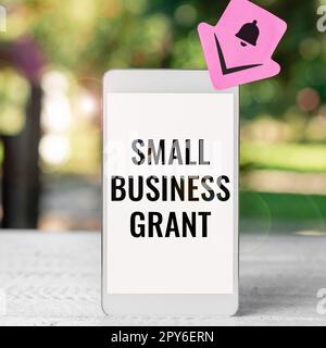 Inspiration montrant l'enseigne Small Business Grant. Concept signifiant une entreprise individuelle connue pour sa taille limitée Banque D'Images