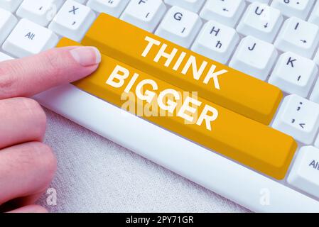 Affiche d'écriture à la main pensez plus grand. Vitrine d'affaires être en mesure de rêver et de visualiser ce que vous pouvez réaliser Banque D'Images