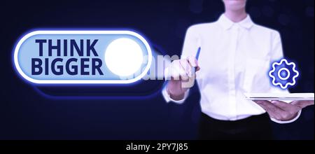 Affiche d'écriture à la main pensez plus grand. Mot pour pouvoir rêver et visualiser ce que vous pouvez réaliser Banque D'Images