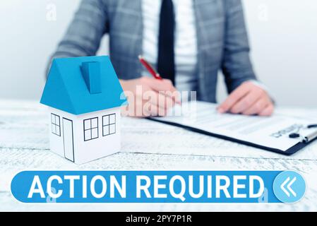 Symbole de texte indiquant action requise. Mot écrit sur considérer une action de quelqu'un en vertu de leur position Banque D'Images