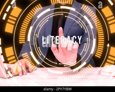 Légende conceptuelle alphabétisation. Concept Internet capacité de lire et d'écrire des compétences ou des connaissances dans un domaine spécifique Banque D'Images