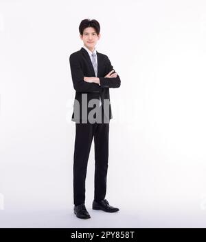 Portrait complet d'un jeune homme d'affaires debout Banque D'Images