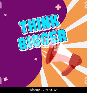 Écriture affichage du texte pensez plus grand. Approche d'entreprise être en mesure de rêver et de visualiser ce que vous pouvez réaliser Banque D'Images