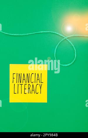 Texte d'écriture littératie financière. Mot pour comprendre et savoir comment fonctionne l'argent Banque D'Images