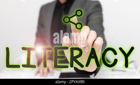 Écriture affichage de la littératie de texte. Concept signifie capacité à lire et à écrire des compétences ou des connaissances dans un domaine spécifique Banque D'Images