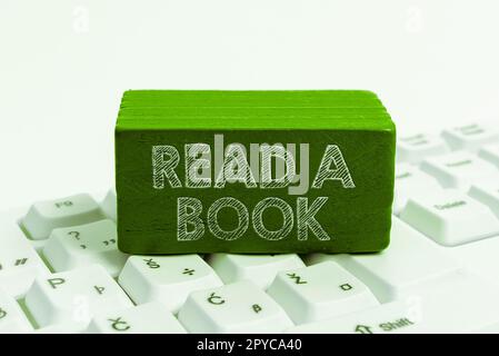 Légende conceptuelle Lire Un livre. Mot pour apprécier la littérature traditionnelle activité apprendre de nouvelles choses Banque D'Images