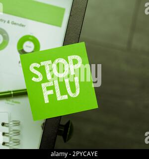 Écriture affichant le texte Arrêter la grippe. Vitrine d'affaires traiter la maladie respiratoire contagieuse causée par le virus de la grippe Banque D'Images