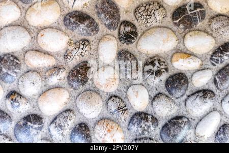 Détail de texture du mur de petites pierres Puerto Escondido Mexique. Banque D'Images