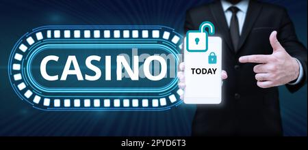 Affiche affichant Casino. Mot écrit sur un bâtiment où les jeux de roulette et les jeux de cartes sont joués Banque D'Images