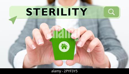 Affiche d'écriture à la main stérilité. Mot écrit sur une condition d'être libre de micro-organismes pathogènes Banque D'Images