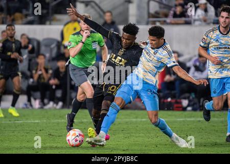 Le défenseur de l'Union de Philadelphie, Nathan Harriel (26) et le milieu de terrain du LAFA, José Cifuentes (20), se battent pour possession lors d'un semi- Banque D'Images