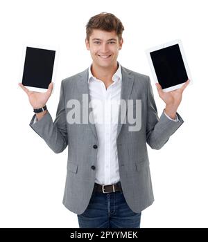 Comment aimez-vous deux pour un. Studio portrait d'un jeune homme présentant des tablettes avec des écrans vierges isolés sur blanc. Banque D'Images