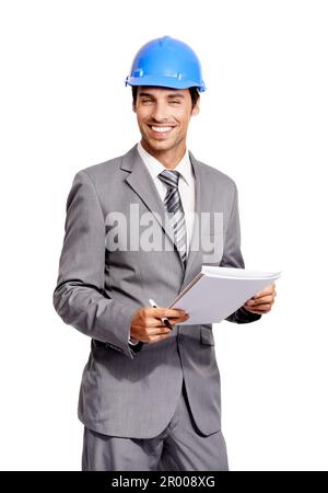 Entrepreneur confiant. Un beau jeune entrepreneur portant et tenant ses notes tout en étant isolé sur un fond blanc. Banque D'Images