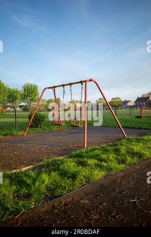 Jeux balançoires à court Road Play Area, Kingswood, Bristol, Royaume-Uni Banque D'Images