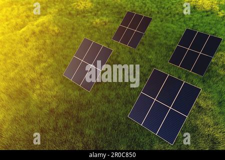 Modules de panneau solaire au coucher du soleil dans un champ sur fond d'herbe verte. Centrale électrique terrestre de remplacement Banque D'Images