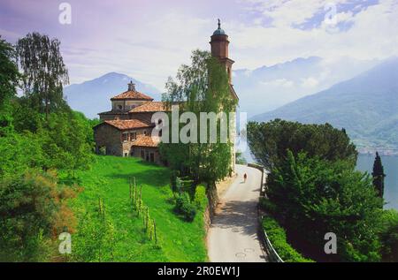 Cycliste sur le lac de Lugano, Vico Morcote, lac de Lugano, Tessin, Suisse Banque D'Images