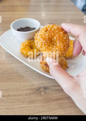 La chaîne de restaurants de franchise internationale propose des styles de pizza, stock photo Banque D'Images