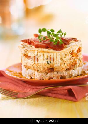 Chorizo, poivrons piquillo, gâteau au riz et cheesecake au piment Banque D'Images