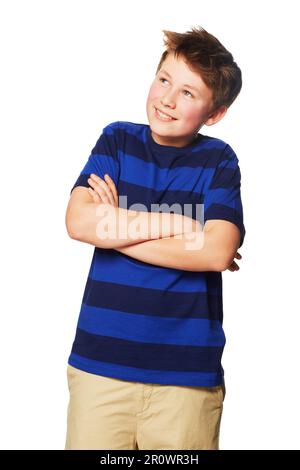 Penser, heureux et un enfant avec les bras croisés et regarder vers le haut isolé sur un fond blanc dans un studio. Sourire, contemplation et un jeune garçon avec Banque D'Images