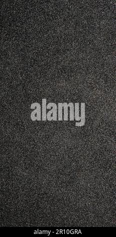 Magnifique portrait de papier de verre noir avec texture rugueuse et arrière-plan pour mobile. Banque D'Images