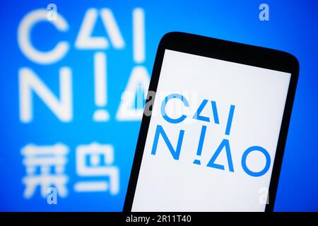 Ukraine. 10th mai 2023. Dans cette illustration, le logo de Cainiao Smart Logistics Network Limited apparaît sur un smartphone et sur un écran d'ordinateur. Crédit : SOPA Images Limited/Alamy Live News Banque D'Images
