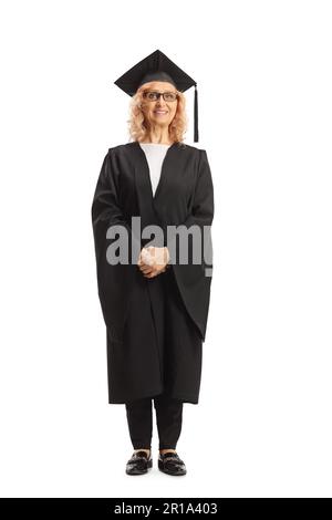 Portrait complet d'une enseignante dans une robe de graduation isolée sur fond blanc Banque D'Images