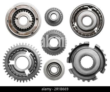 Jeu avec différents engrenages en acier inoxydable sur fond blanc, vue de dessus Banque D'Images