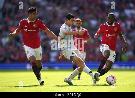 Casemiro de Manchester United, Raul Jimenez de Wolverhampton Wanderers et Aaron WAN-Bissaka de Manchester United (gauche-droite) en action lors du match de la Premier League à Old Trafford, Manchester. Date de la photo: Samedi 13 mai 2023. Banque D'Images