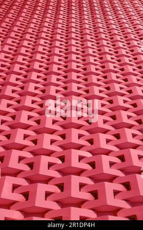 Faible angle de mur de couleur corail 3D surface pour l'arrière-plan et le papier peint Banque D'Images