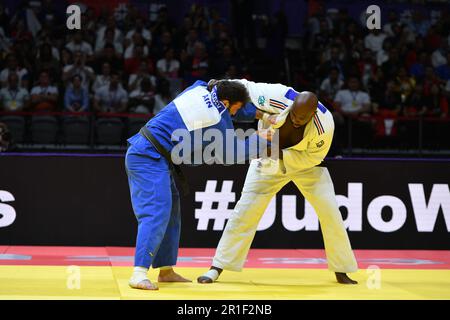 Doha, Qatar. 13th mai 2023. Teddy Riner (FRA) lutte contre Inal Tasoev (AIN) lors du match final de la catégorie des hommes +100kg au champion du monde de judo Banque D'Images