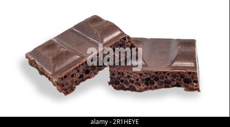 Morceaux de lait chocolat cellulaire sur fond blanc. isolat de chocolat Banque D'Images