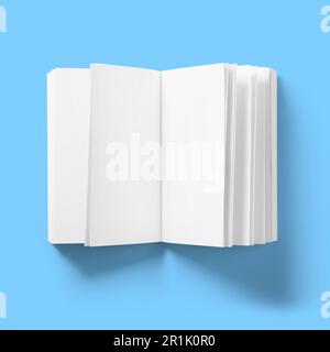 Retour à l'école concept , couverture rigide blanc pages de livre soulevées ouvert isolé sur bleu. Banque D'Images