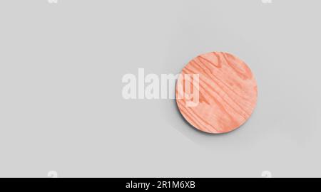 Dessous de verre en liège rond vide, isolé sur fond gris. Parfait comme présentoir de nourriture. Banque D'Images