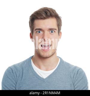 jeune homme à l'air agréablement surpris par la bouche ouverte Banque D'Images