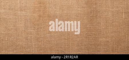 Motif jute, texture toile rugueuse, toile épaisse, ensachage rustique tissé brun. Texture textile beige hessienne naturelle. Toile de fond en lin. THR Banque D'Images