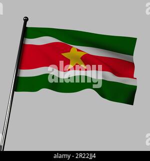 3D drapeau du Suriname agitant dans le vent, isolé sur un gris. Le drapeau comporte des bandes horizontales de vert, blanc et rouge, avec une étoile jaune au centre. Banque D'Images