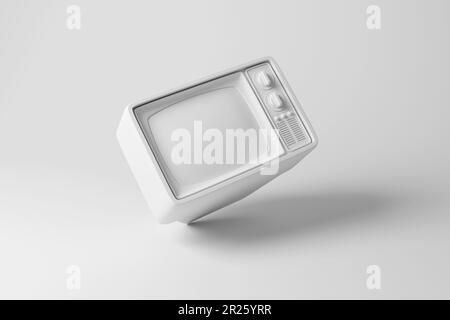 Téléviseur rétro blanc sur fond blanc pour créer des images monochromes. Illustration du concept des articles à l'ancienne et de la diffusion de la télévision Banque D'Images