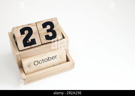 Calendrier perpétuel en bois montrant le 23rd octobre Banque D'Images