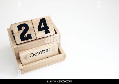 Calendrier perpétuel en bois montrant le 24th octobre Banque D'Images