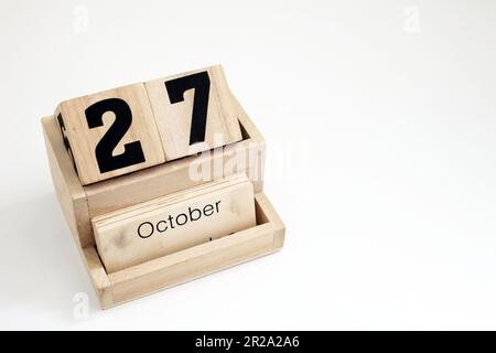 Calendrier perpétuel en bois montrant le 27th octobre Banque D'Images