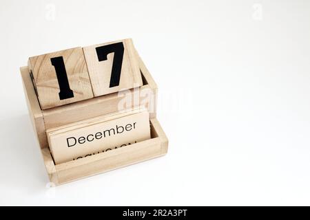 Calendrier perpétuel en bois montrant le 17th décembre Banque D'Images