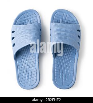 Chaussons en caoutchouc bleu isolés sur fond blanc Banque D'Images