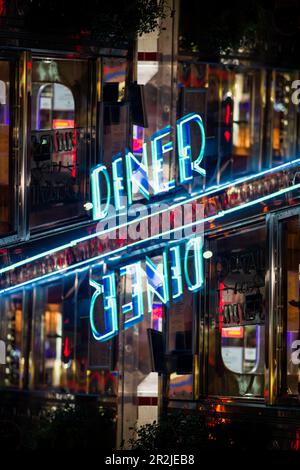 Double exposition d'un panneau de restaurant au néon à Miami, en Floride Banque D'Images