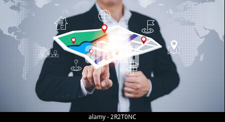 Homme d'affaires touchez le monde virtuel et la carte modèle avec le point de position , l'application GPS, l'icône cartes de voyage et trouver des lieux dans le système en ligne, tous les écrans gr Banque D'Images