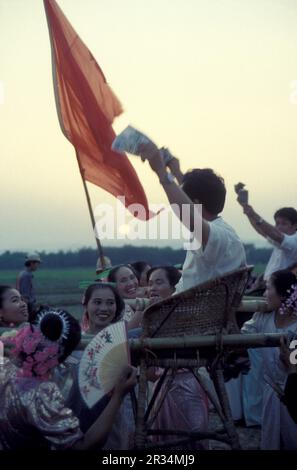 Les gens au Printemps et Rocket Festival Buon Bang Fai près de la ville de Jinghong à Xishuangbanna dans la région de la province de Yunnan en Chine Banque D'Images