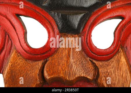 Masque en bois peint traditionnel asiatique close up Banque D'Images