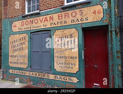 Donovan Bros entreprise victorienne avec signe fantôme, fournisseurs de sacs de papier - 46 Crispin St, Londres E1 6HQ Banque D'Images