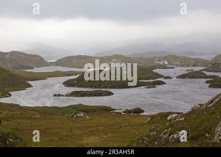 Loch Pocrapool, un jour de Misty à la pluie, Harris, Isle of Harris, Hebrides, Hebrides extérieures, Îles de l'Ouest, Écosse, Royaume-Uni, Grande-Bretagne Banque D'Images