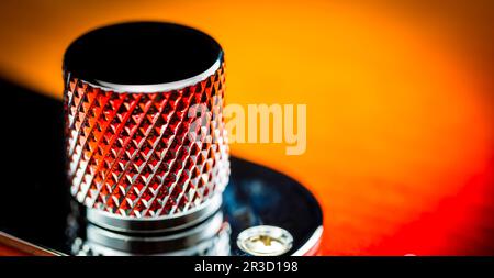 Macro close up d'une guitare électrique bouton de volume avec motif intéressant Banque D'Images