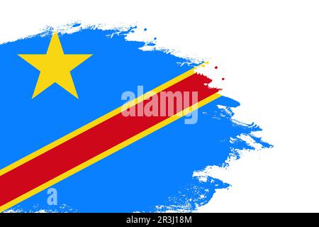 Drapeau de la République démocratique du Congo sur un pinceau coloré peint sur fond blanc isolé avec espace de copie Banque D'Images